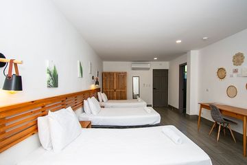 Hotel Yuli Dreibettzimmer Betten