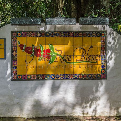 Finca Rosa Blanca Schild Blick auf ein Schild