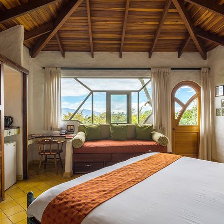 Finca Rosa Blanca Juniorsuite Bett Blick auf ein Bett