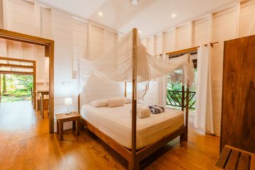 Casa Viva Lodge Deluxebungalow Bett