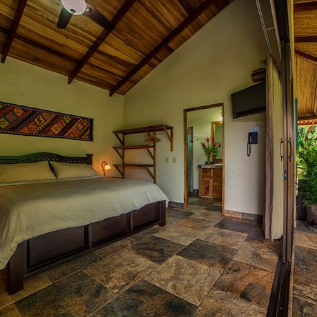 La Finca Lodge Villa Bett Blick auf ein Bett