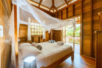 Casa Viva Lodge Standardbungalow Bett